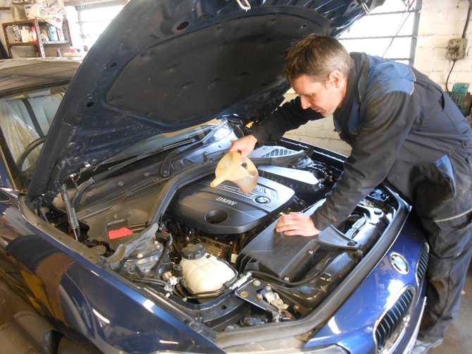 Under-bonnet BMW workshop service at Golden Hill Garage