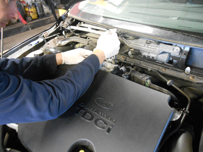 Close-up under-bonnet work on a Ford at Golden Hill Garage